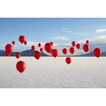 The Picturalist | via Getty Images Gallery Red Balloons on Salt Flats