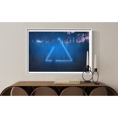 Framed Print on Rag Paper Blue neon triangle light between pine trees with futuristic visual effect by Artur Debat via Getty Images Gallery