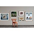Framed Print on Rag Paper Giraffe in living room by Matthias Clamer via getty Images Gallery