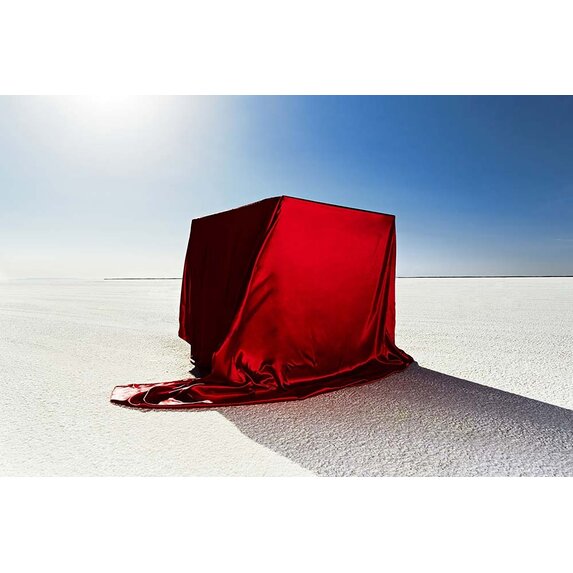 Getty Images Gallery Box covered in red fabric on salt flats by Andy Ryan