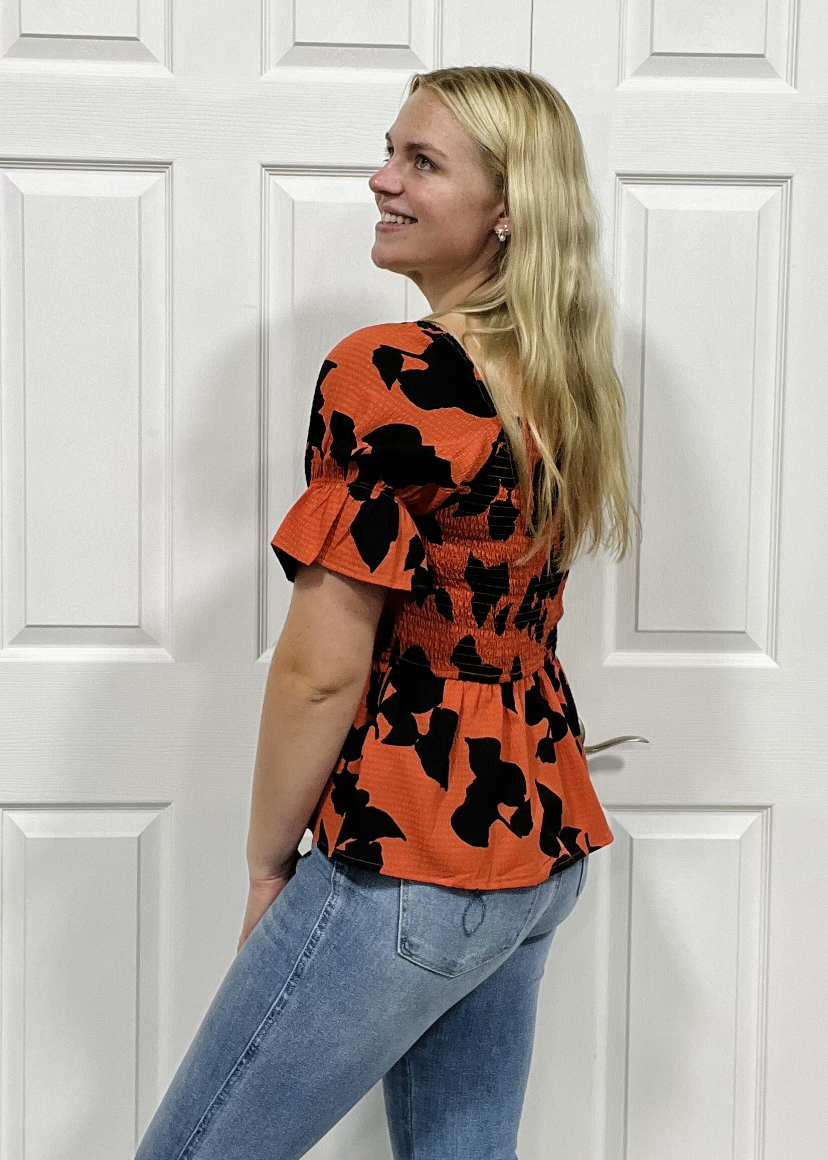 Bailey in Bold Peplum Top