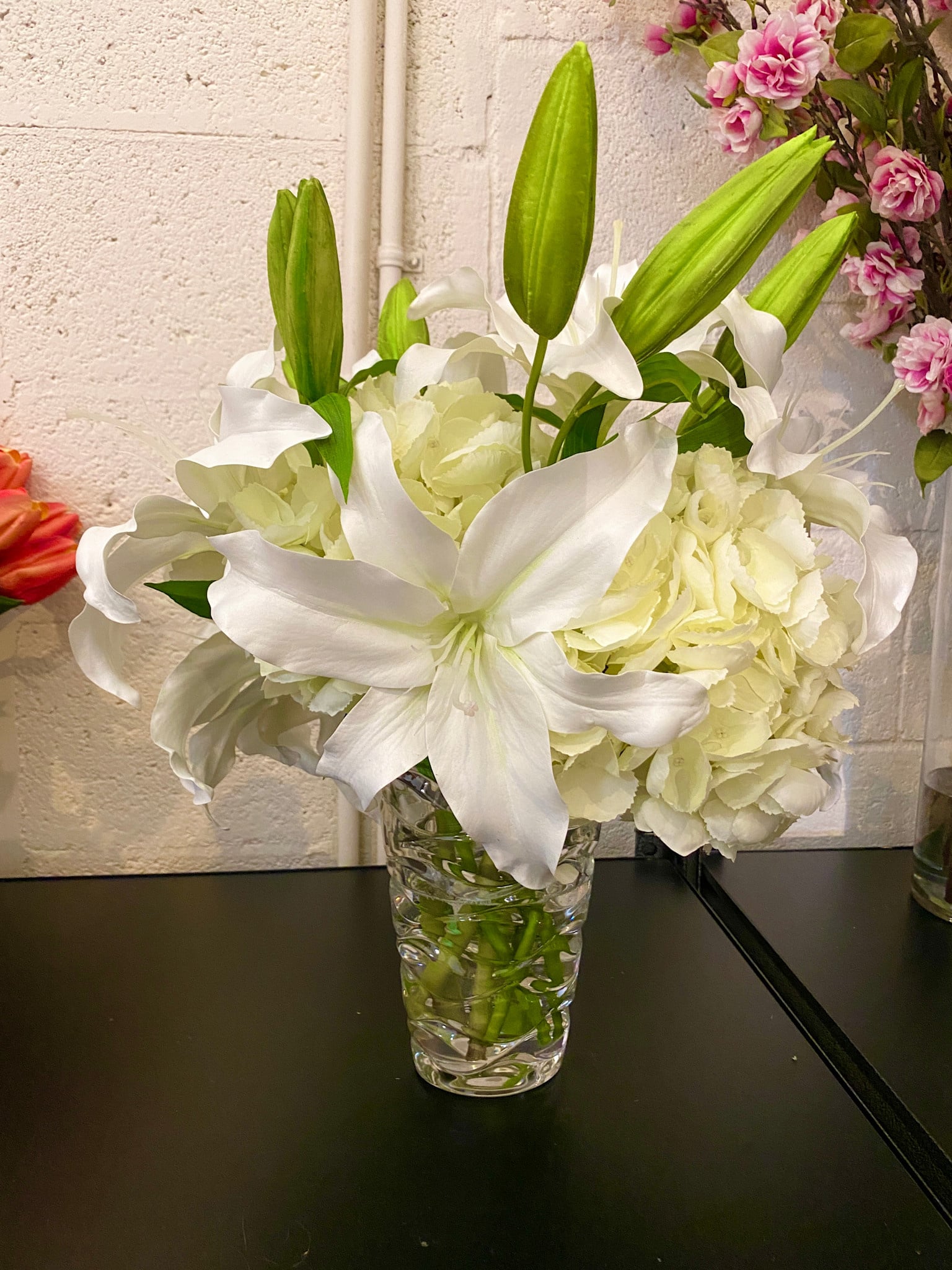 Casablanca Lillies & Hydrangea  in Small Laguna Vase-Faux Water (White)