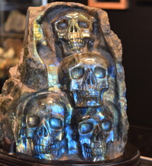 Labradorite 4-Skull Carving in Custom Wood Stand