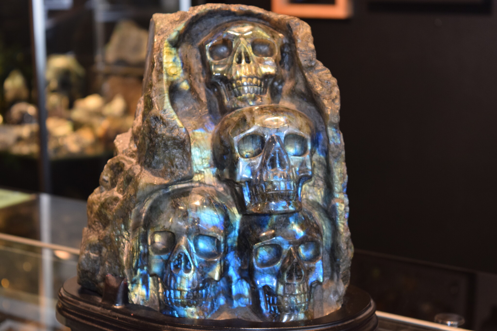 Labradorite 4-Skull Carving in Custom Wood Stand
