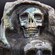 Labradorite 4-Skull Carving in Custom Wood Stand