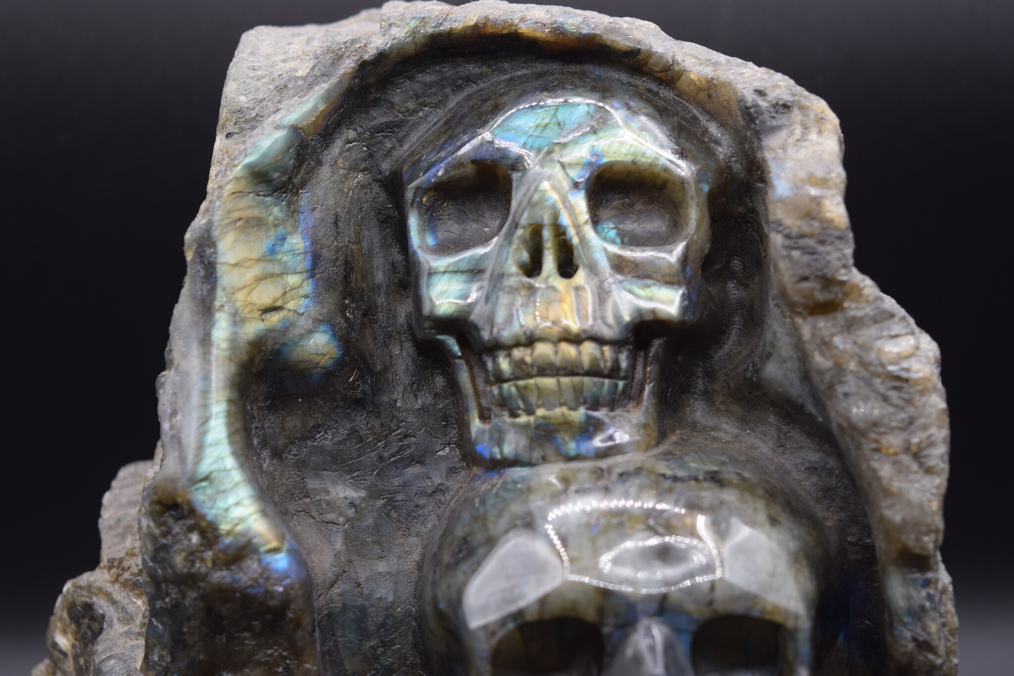 Labradorite 4-Skull Carving in Custom Wood Stand