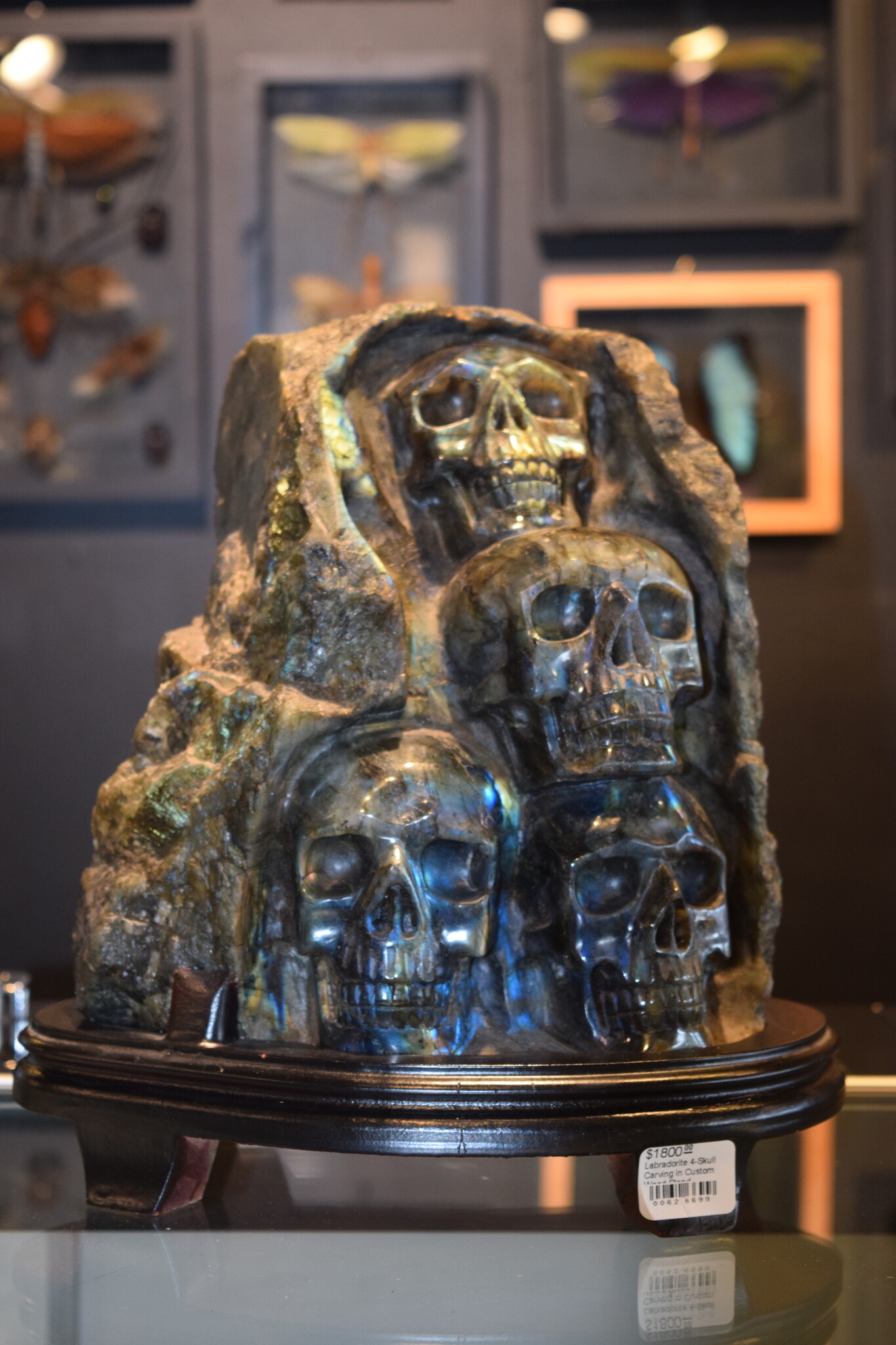 Labradorite 4-Skull Carving in Custom Wood Stand
