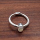 STB 001 SS Rainbow Moonstone 7mm Oval, Bezel Set Textured Snake Band, Ring Size 7
