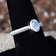 STB 001 SS Rainbow Moonstone 7mm Oval, Bezel Set Textured Snake Band, Ring Size 7
