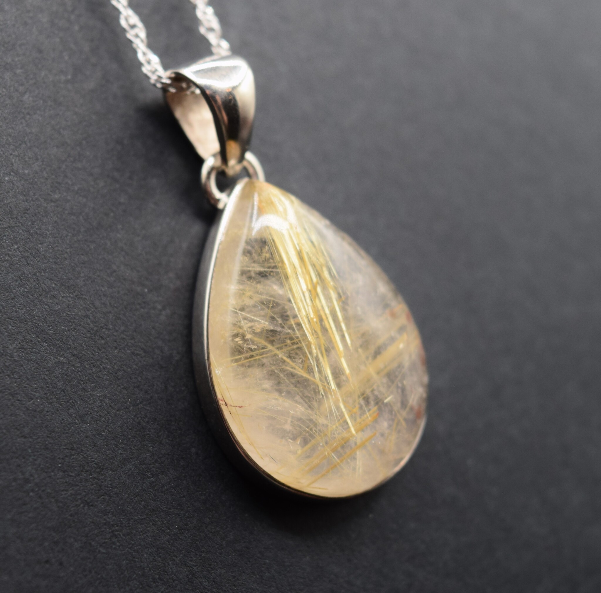 SS Rutilated Quartz 17x25mm Pear Shape Cabochon Bezel Set Pendant