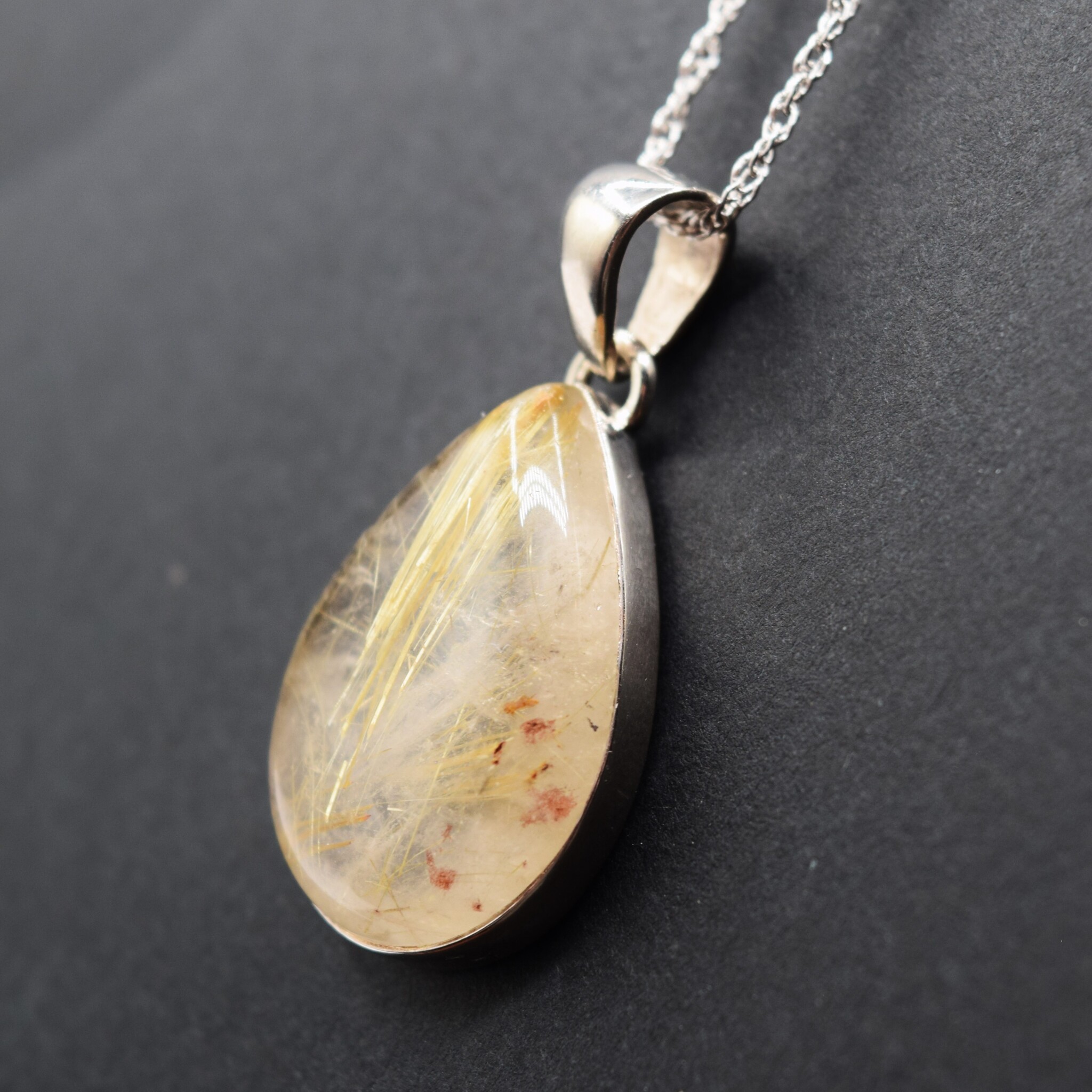 SS Rutilated Quartz 17x25mm Pear Shape Cabochon Bezel Set Pendant