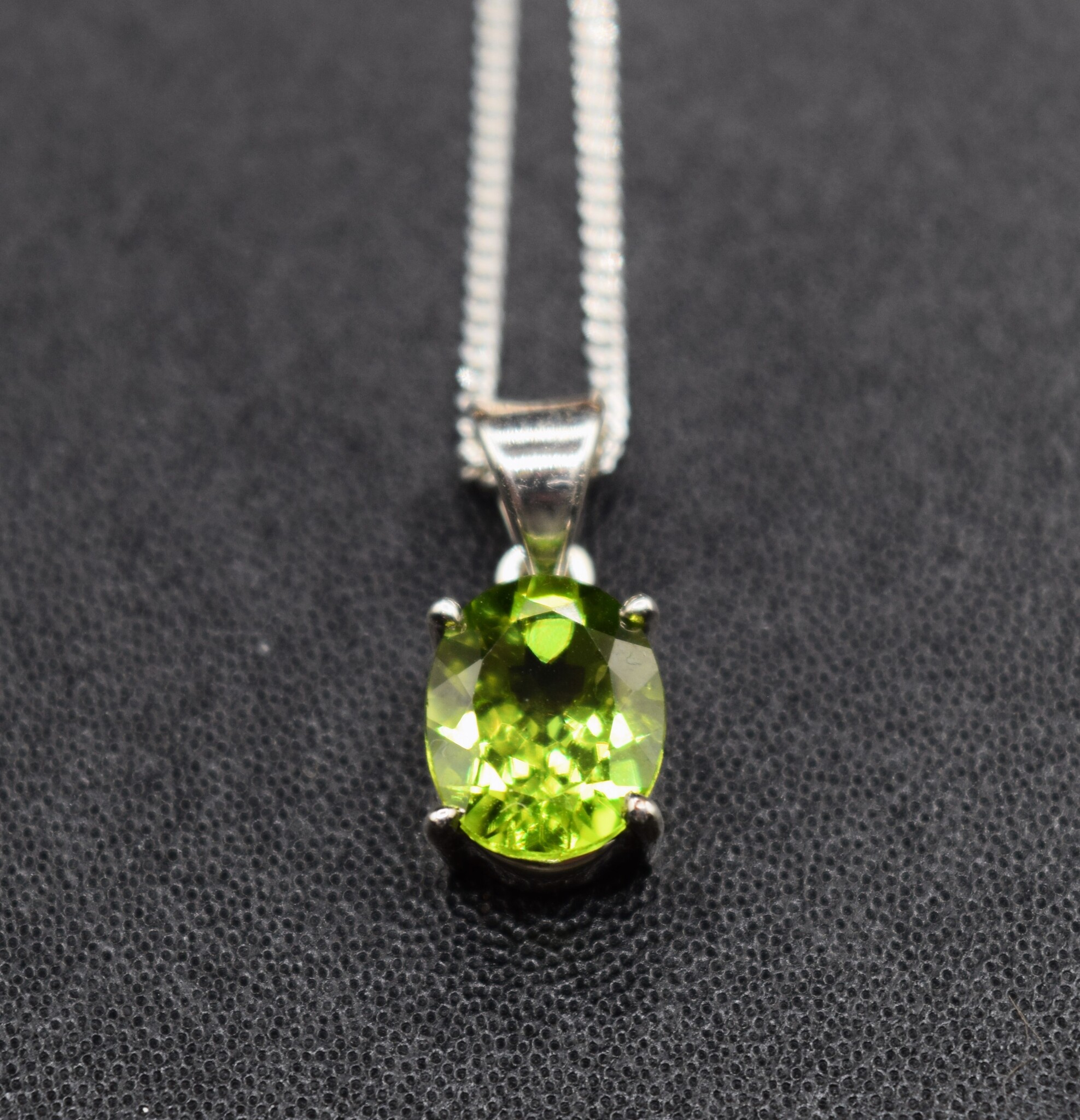 SS Peridot 10mm Faceted Oval Prong Set Pendant on 18" Chain