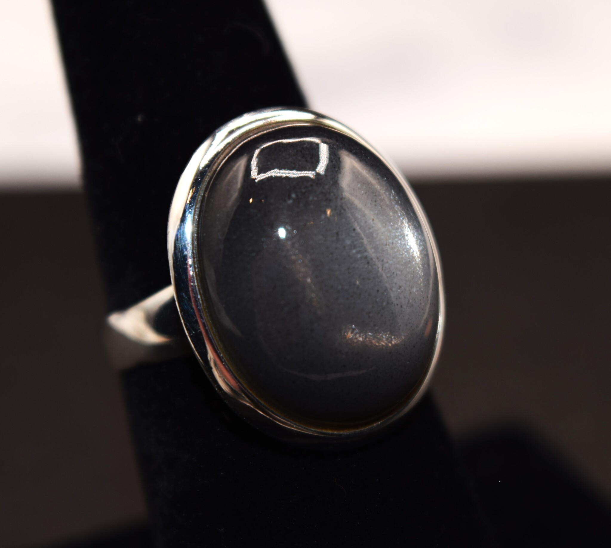 ZEI 004 SS Black Moonstone 15mm x 18mm Oval Cab Bezel-Set Ring, sz. 7