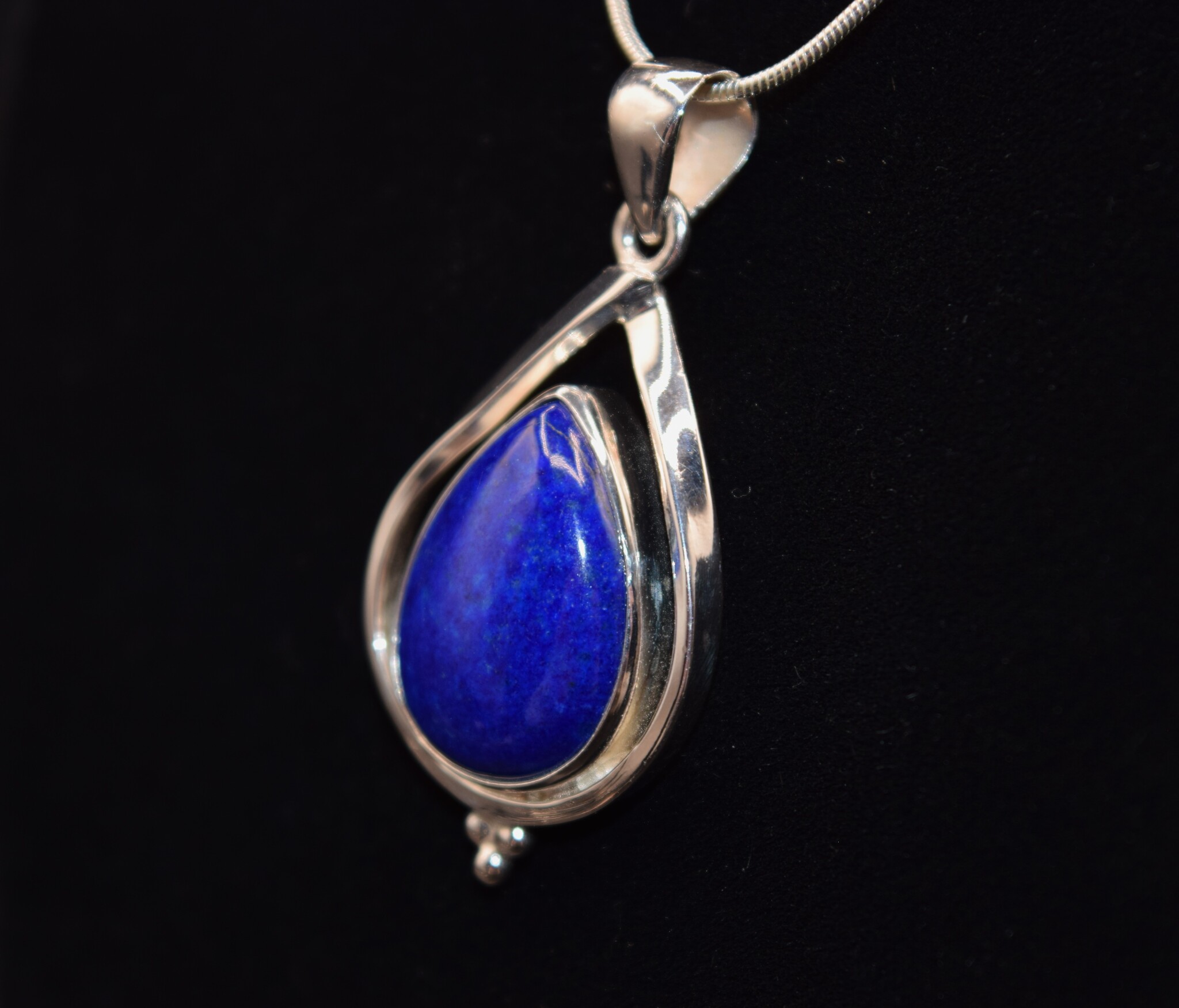 SAF 006 SS Lapis Lazuli Pear 20x19mm Cabochon Bezel-Set in Floating Frame Pendant