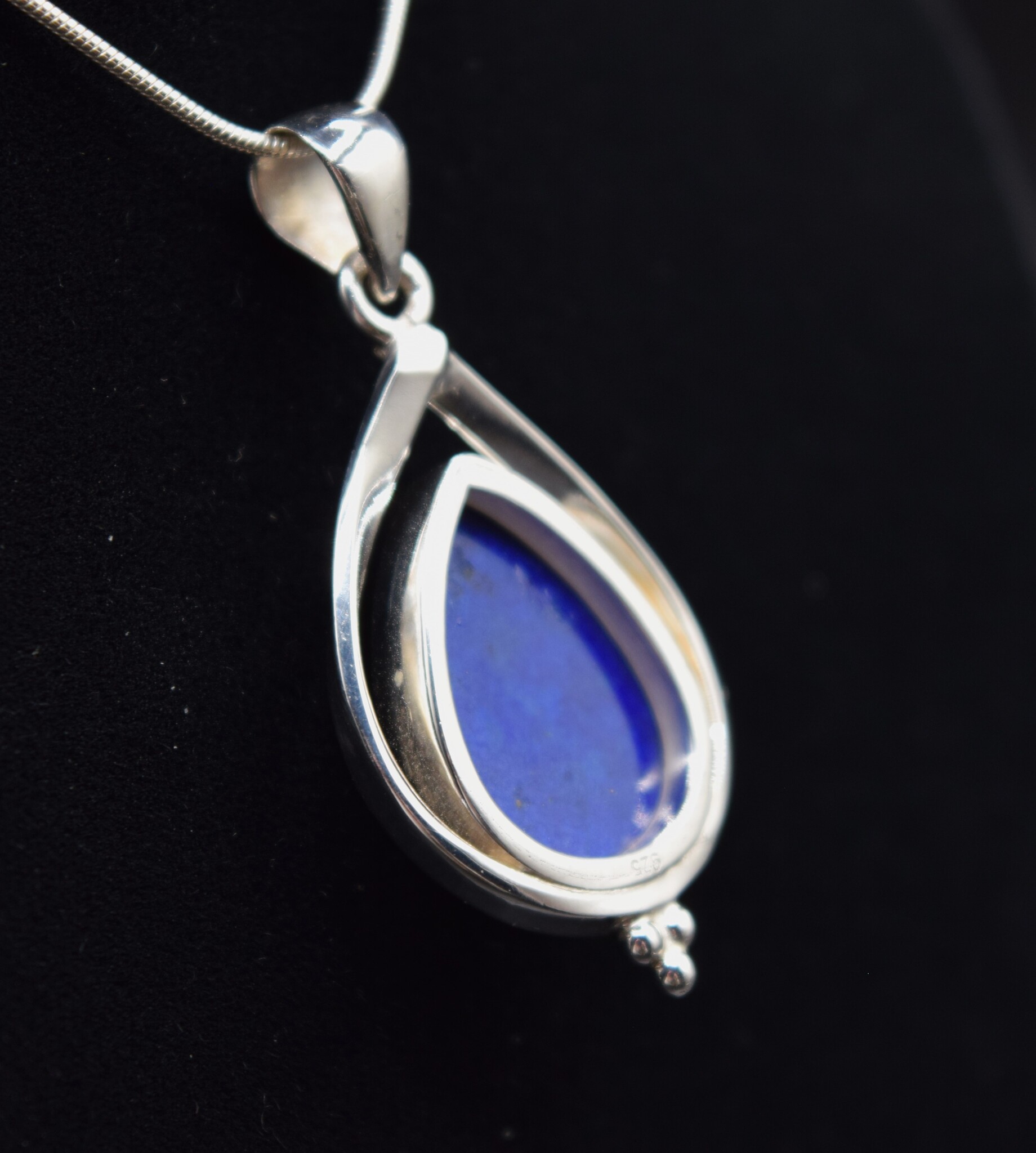 SAF 006 SS Lapis Lazuli Pear 20x19mm Cabochon Bezel-Set in Floating Frame Pendant