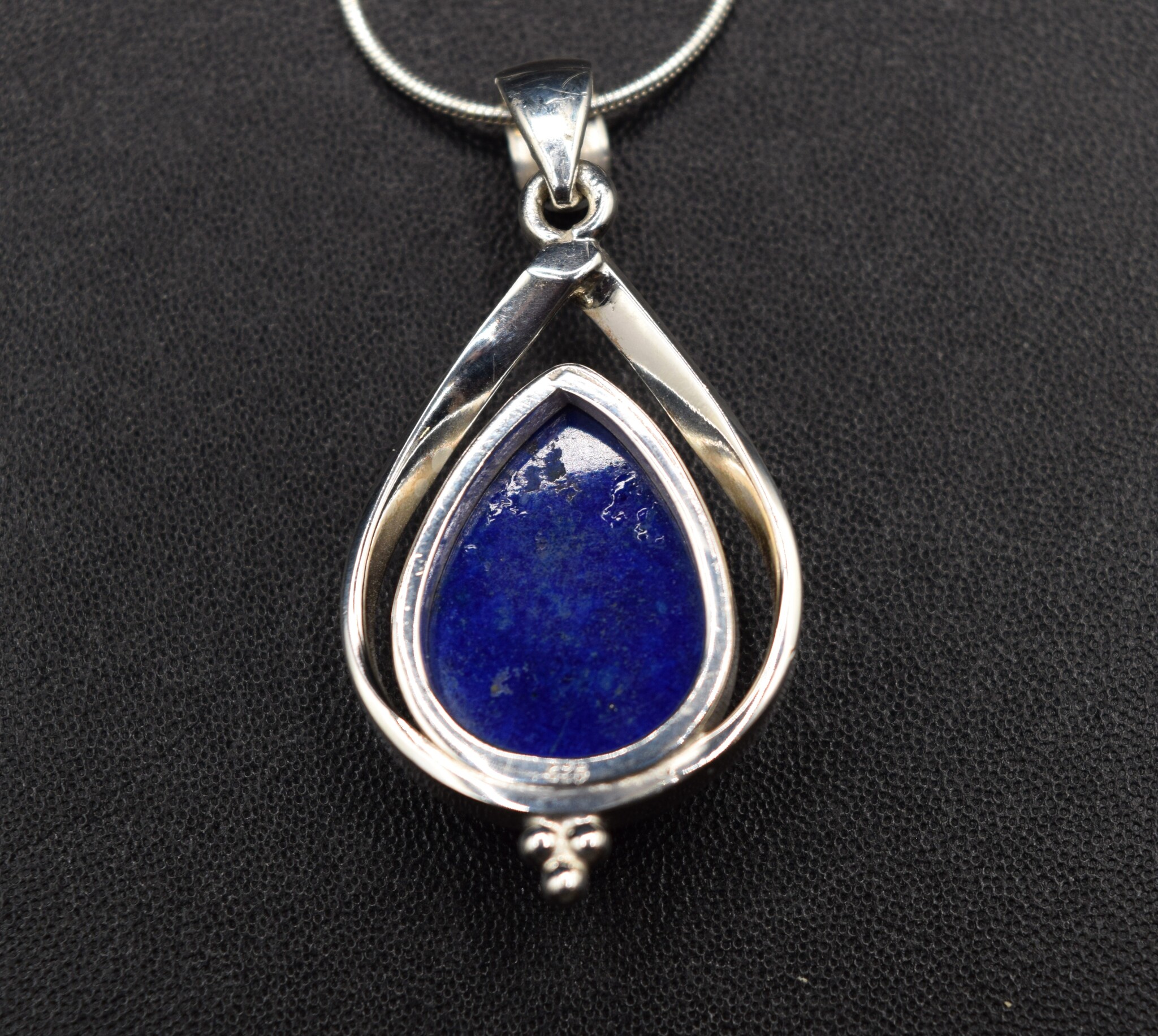 SAF 006 SS Lapis Lazuli Pear 20x19mm Cabochon Bezel-Set in Floating Frame Pendant