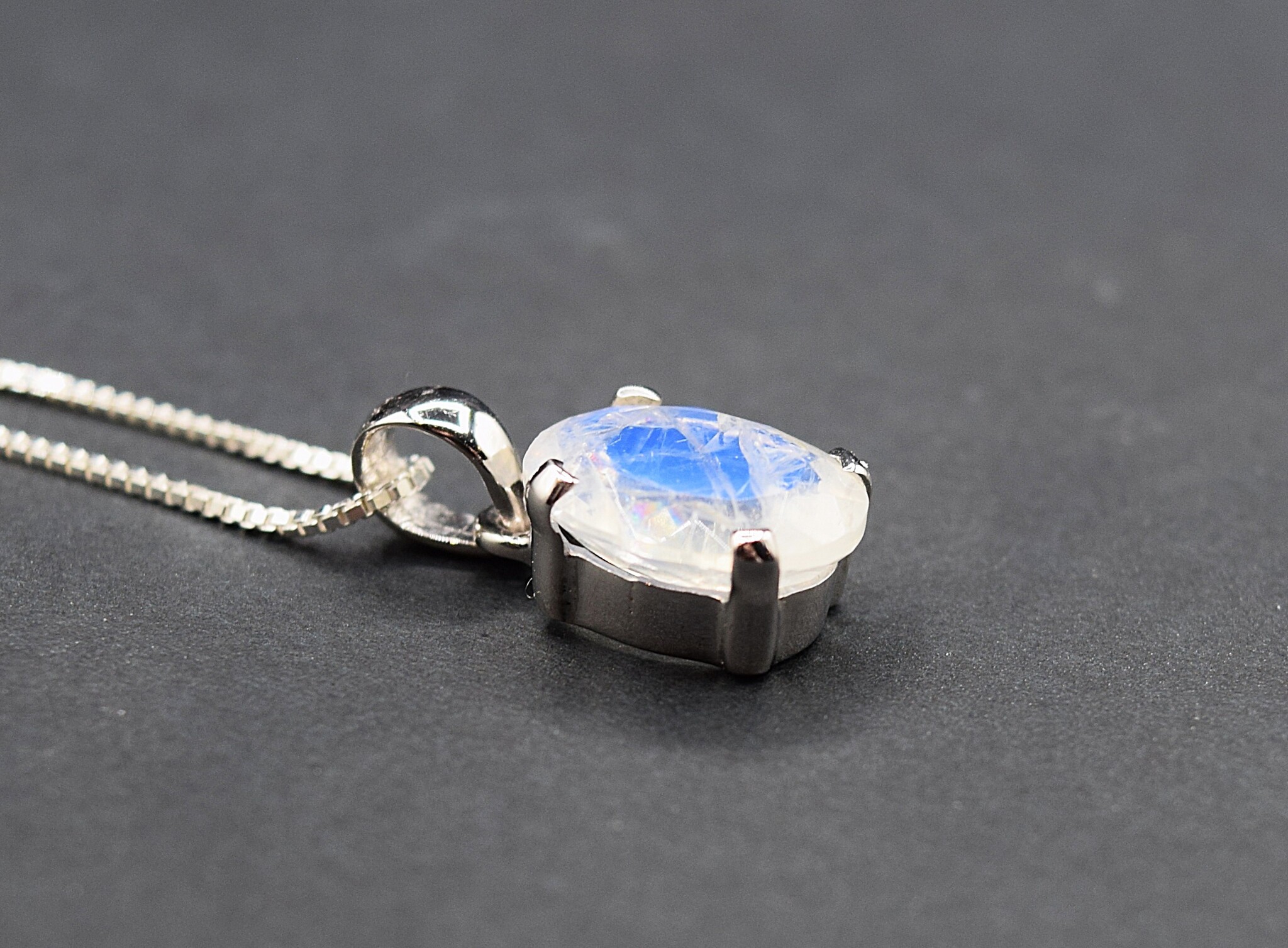 SS Rainbow Moonstone 12mm Faceted Oval Prong-Set on 18" Box Chain Necklace