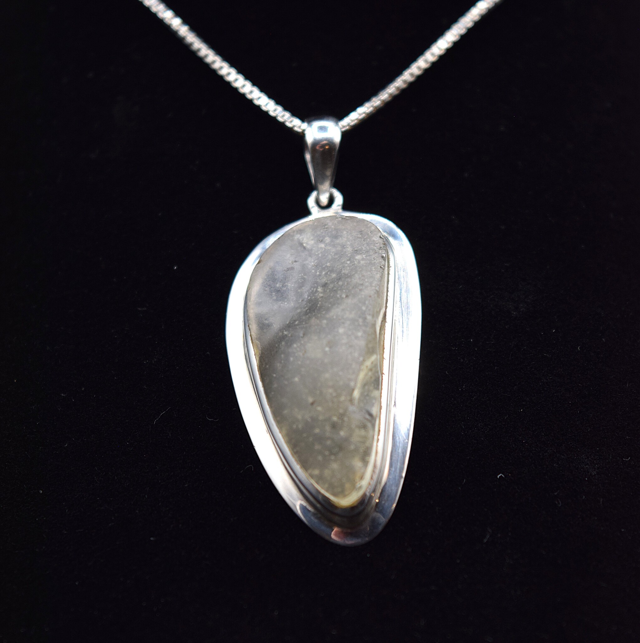 SUG 011 SS Libyan Tektite Rough 15x36mm Freeform Bezel Set Pendant