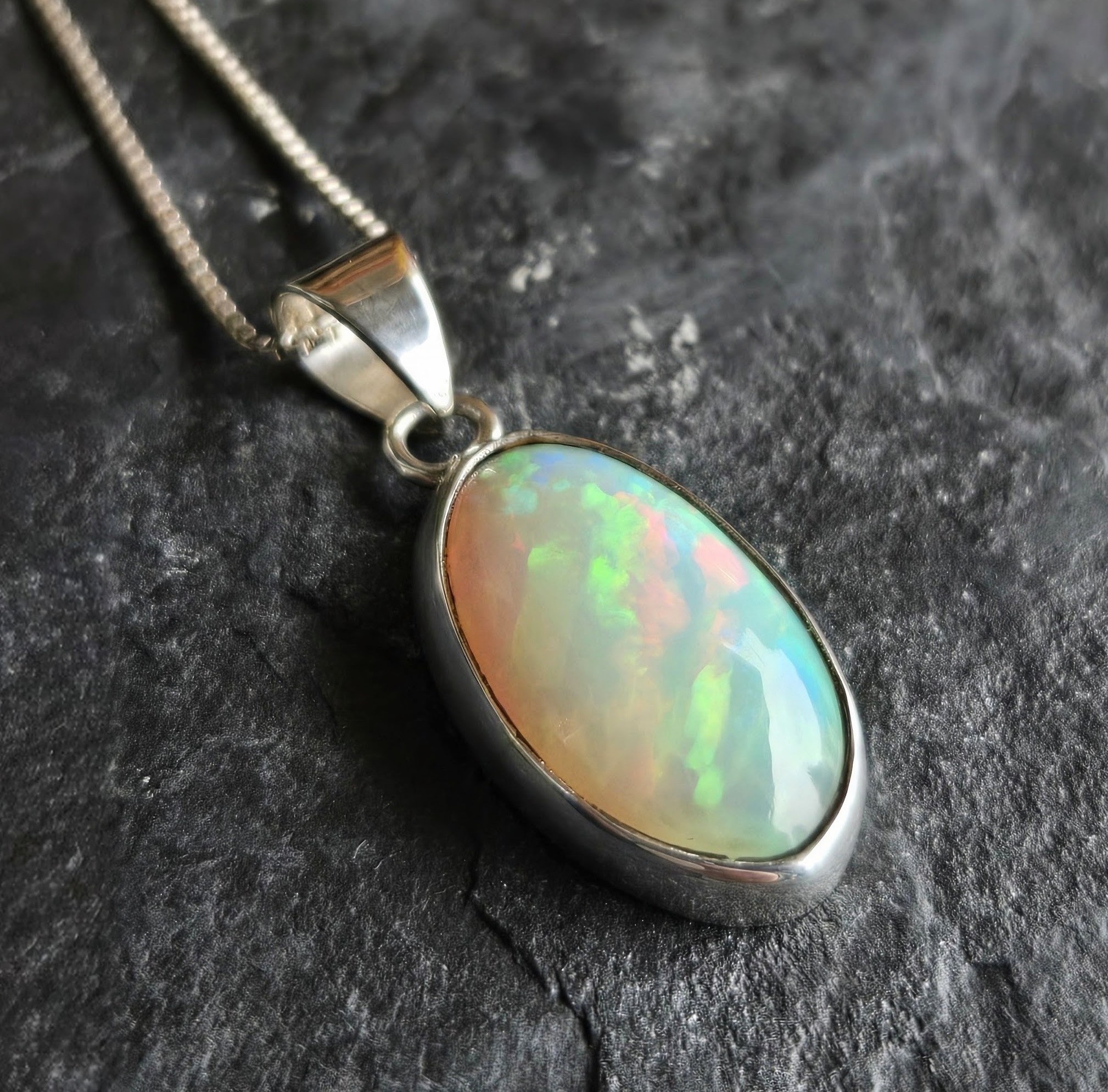 WLM 024 SS Ethiopian Fire Opal 13x19mm Oval Cabochon Bezel Set Pendant With Box Chain Necklace, 18"