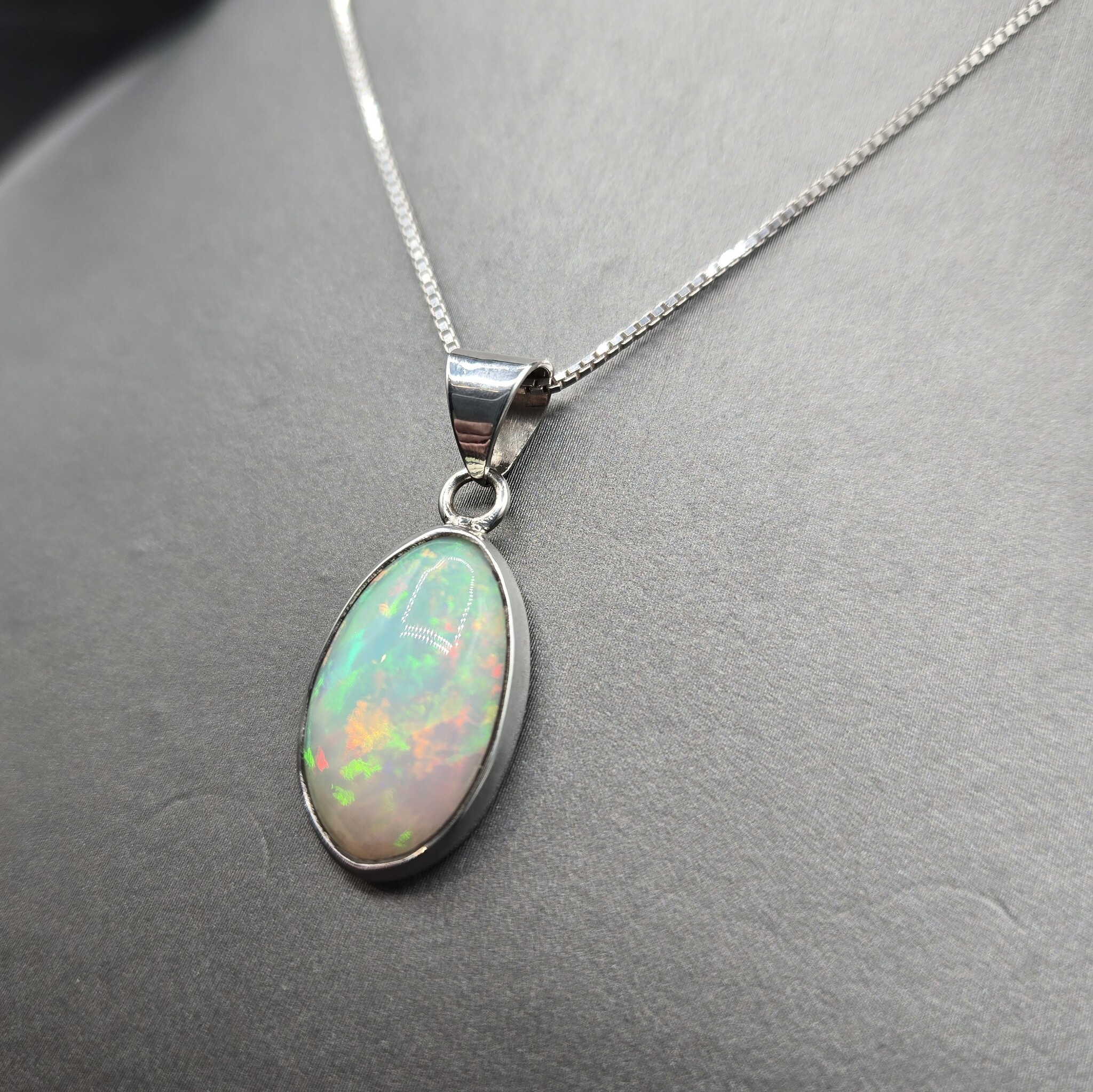 WLM 024 SS Ethiopian Fire Opal 13x19mm Oval Cabochon Bezel Set Pendant With Box Chain Necklace, 18"