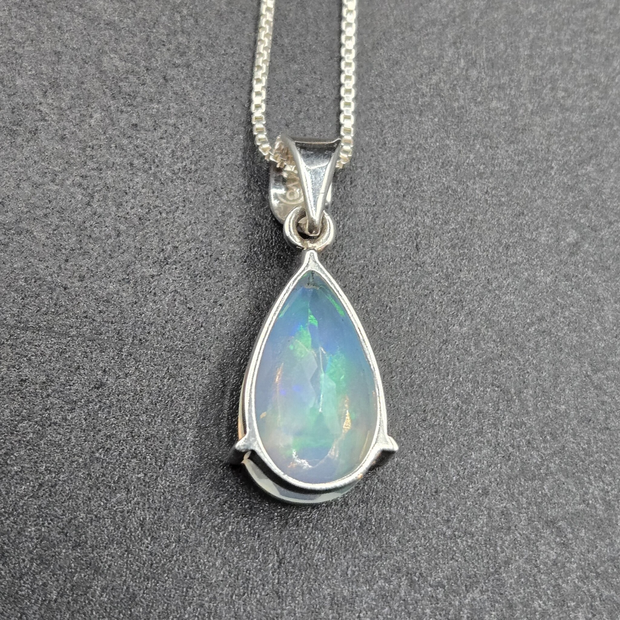 SS Ethiopian Opal Faceted Teardrop Three-Prong Set Pendant on 18" Chain Necklace