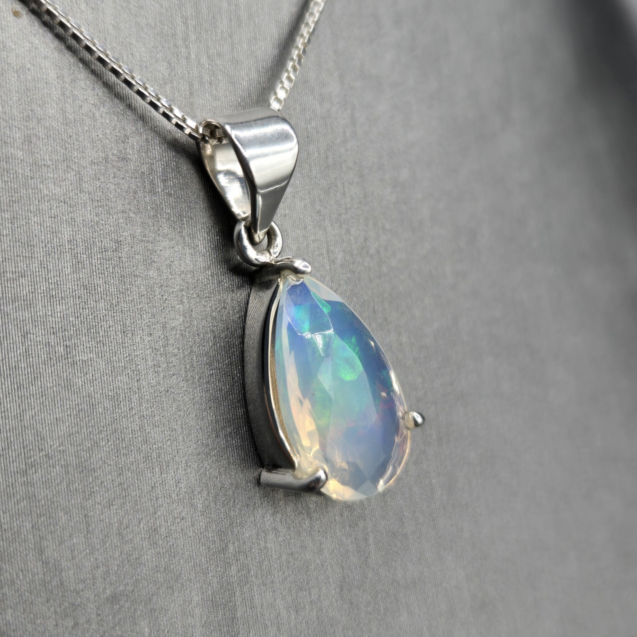 SS Ethiopian Opal Faceted Teardrop Three-Prong Set Pendant on 18" Chain Necklace