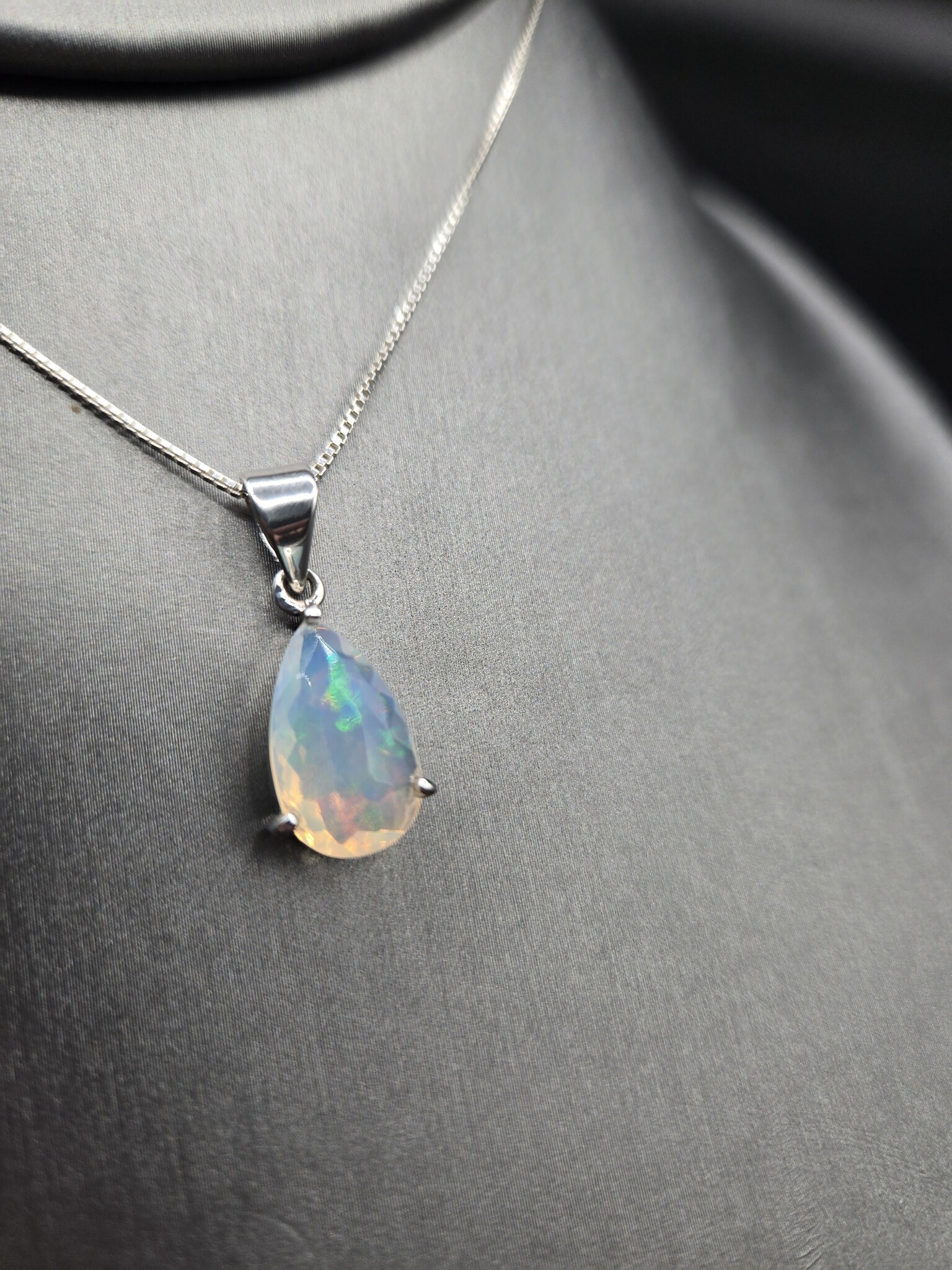 SS Ethiopian Opal Faceted Teardrop Three-Prong Set Pendant on 18" Chain Necklace