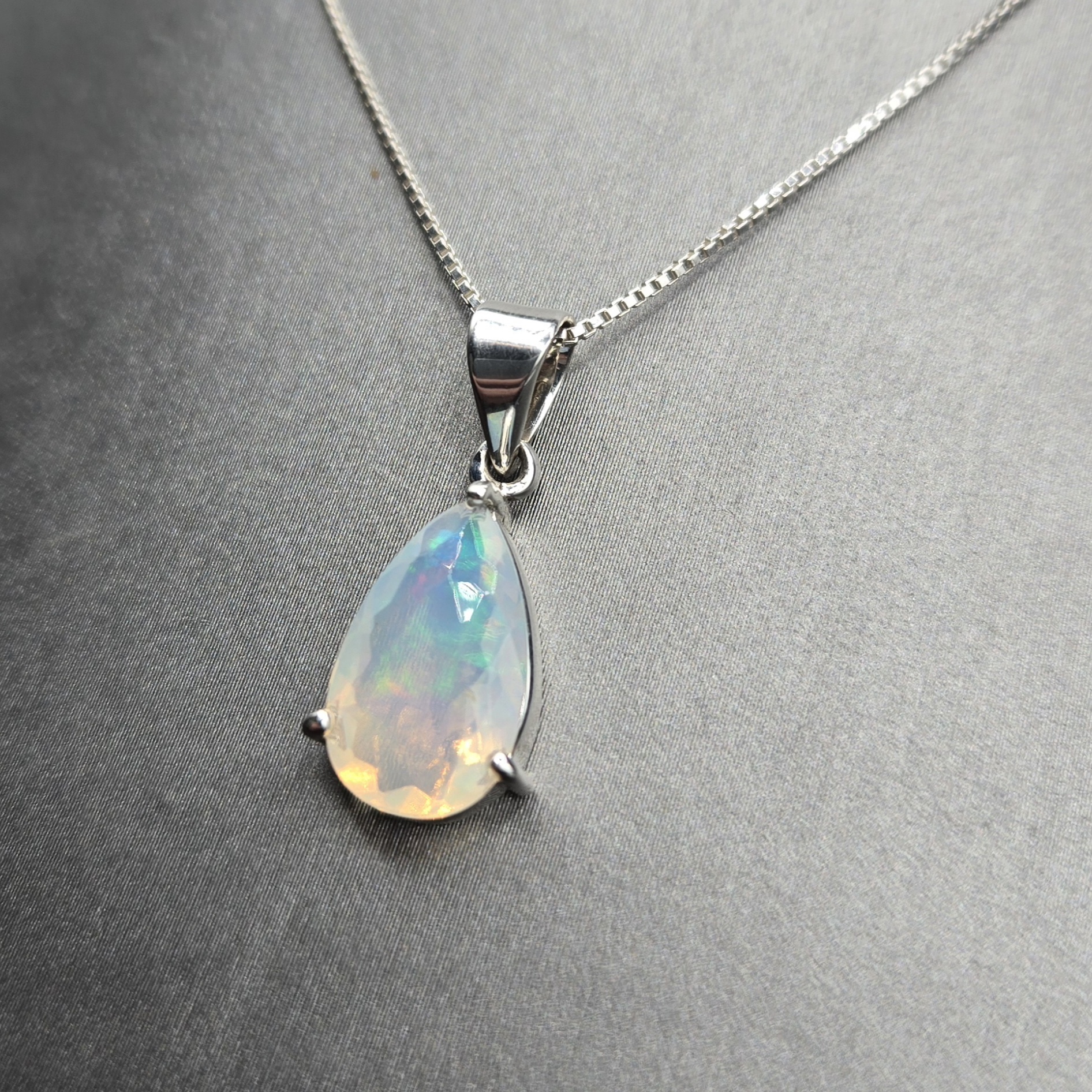SS Ethiopian Opal Faceted Teardrop Three-Prong Set Pendant on 18" Chain Necklace