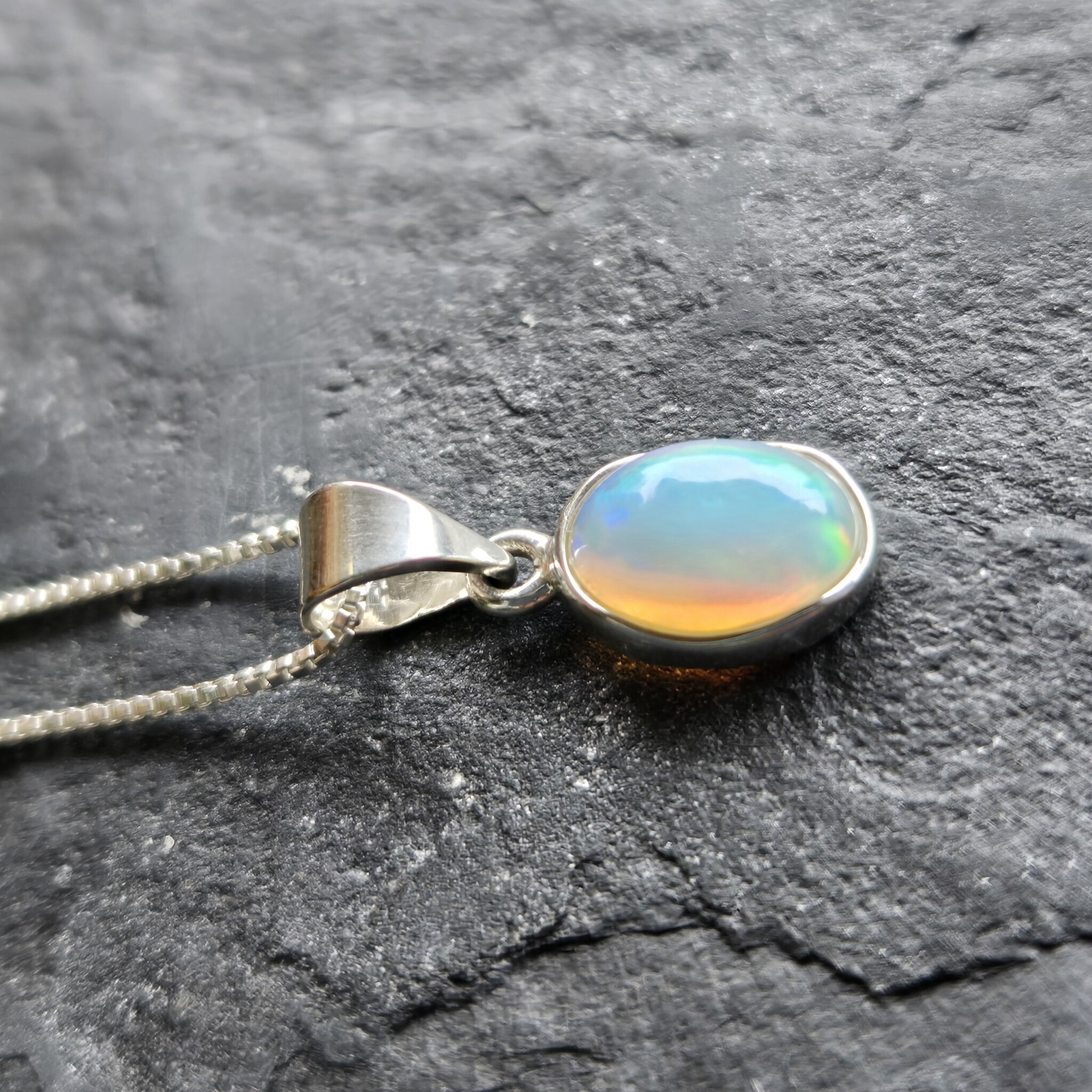 VIT 005 SS Ethiopian Opal 10mm Oval Polished Bezel Set Necklace 18"