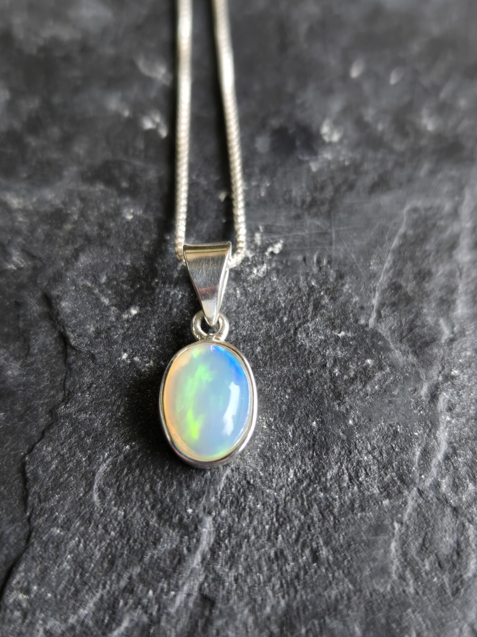 VIT 005 SS Ethiopian Opal 10mm Oval Polished Bezel Set Necklace 18"