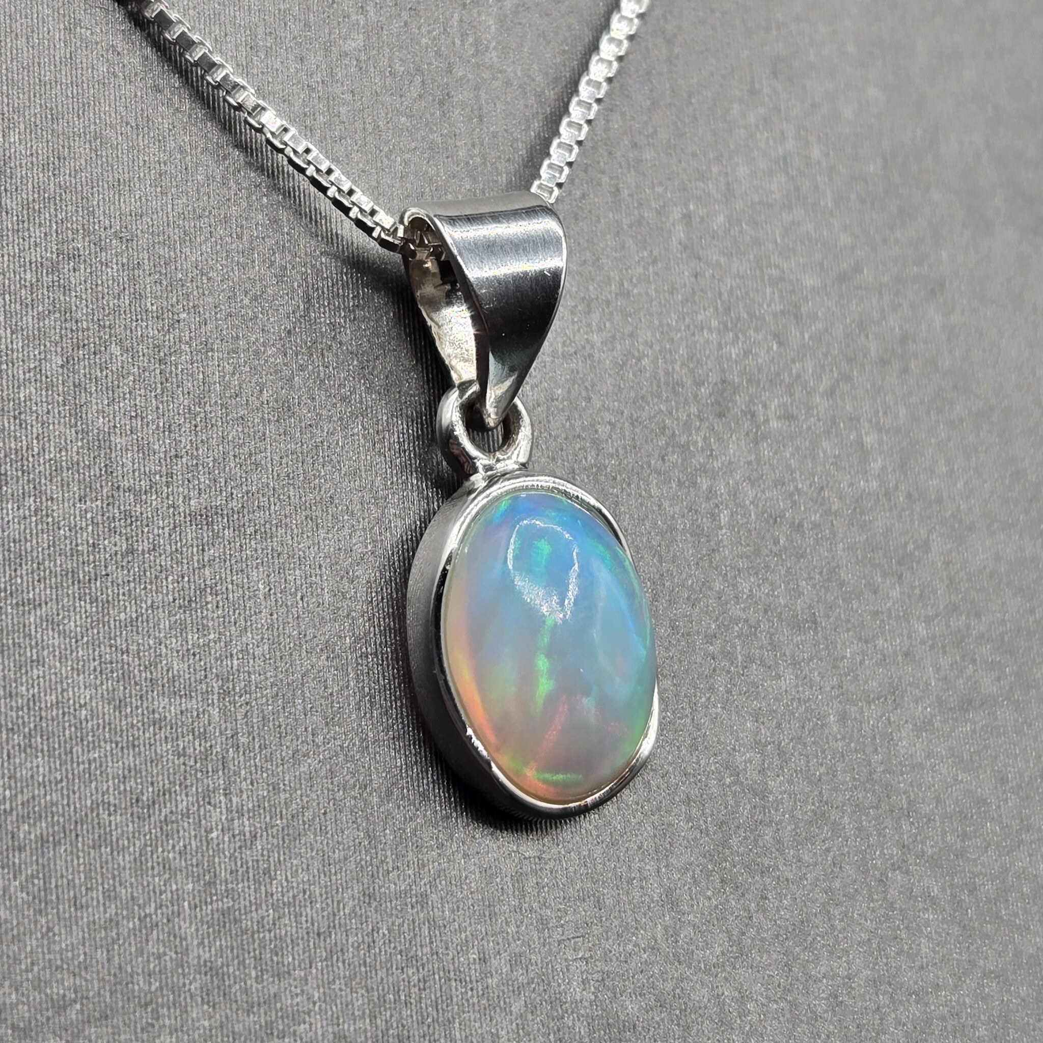 VIT 005 SS Ethiopian Opal 10mm Oval Polished Bezel Set Necklace 18"