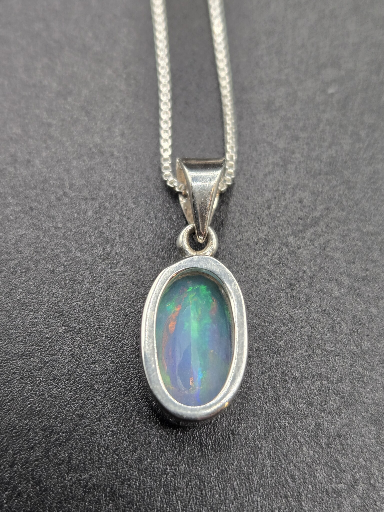 VIT 005 SS Ethiopian Opal Faceted 8x13mm Oval Bezel Set Pendant With Box Chain Necklace, 18"