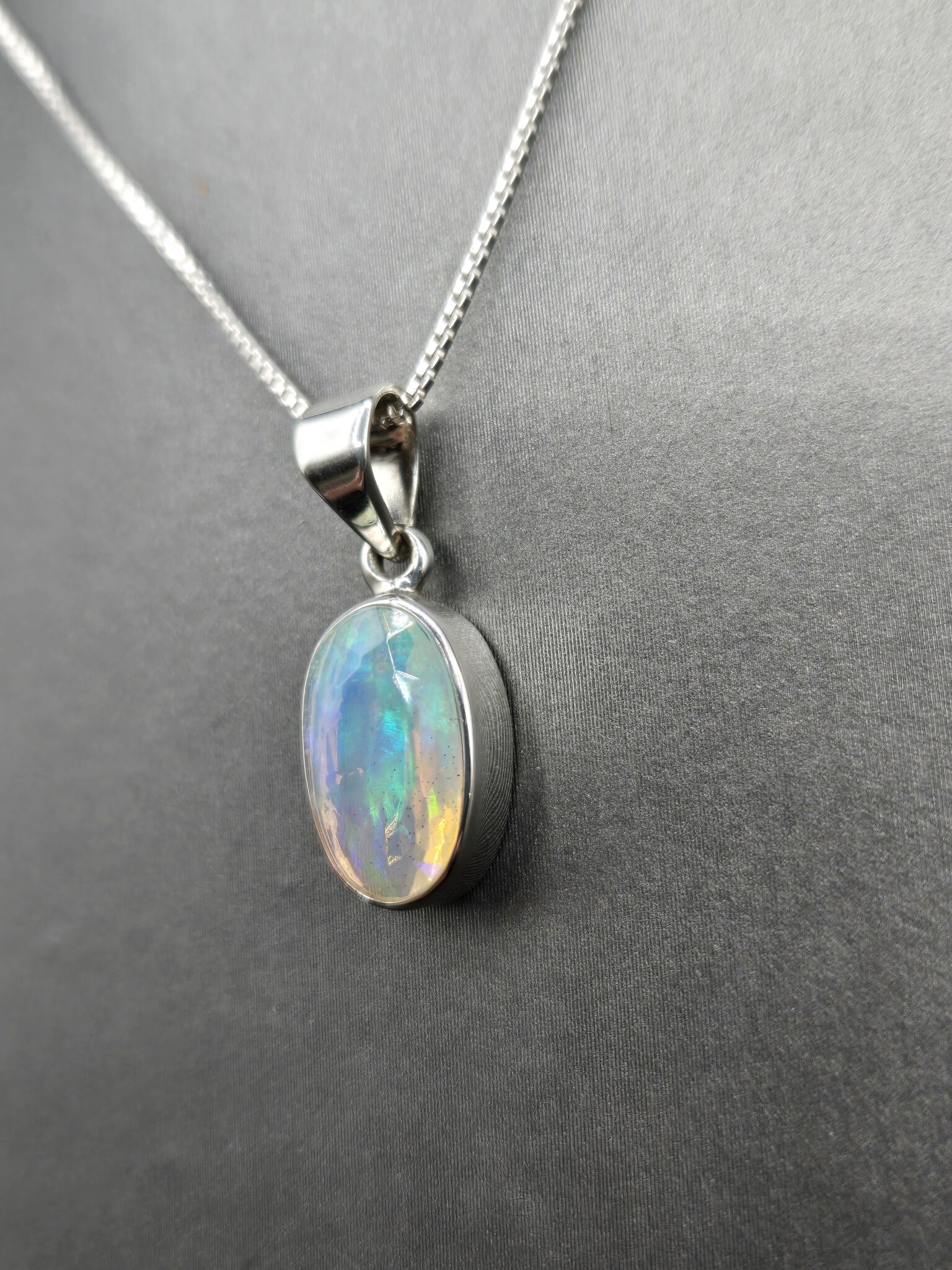 VIT 005 SS Ethiopian Opal Faceted 8x13mm Oval Bezel Set Pendant With Box Chain Necklace, 18"
