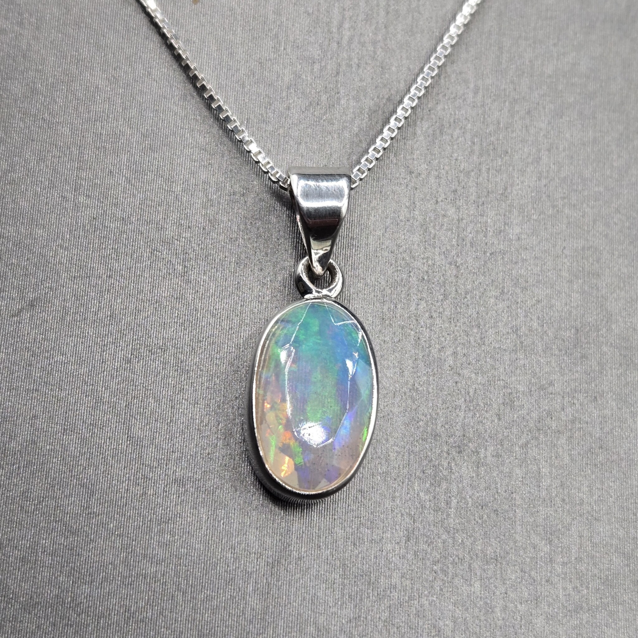 VIT 005 SS Ethiopian Opal Faceted 8x13mm Oval Bezel Set Pendant With Box Chain Necklace, 18"