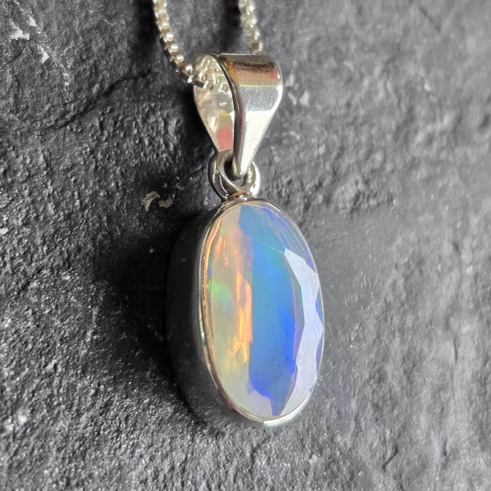 VIT 005 SS Ethiopian Opal Faceted 8x13mm Oval Bezel Set Pendant With Box Chain Necklace, 18"