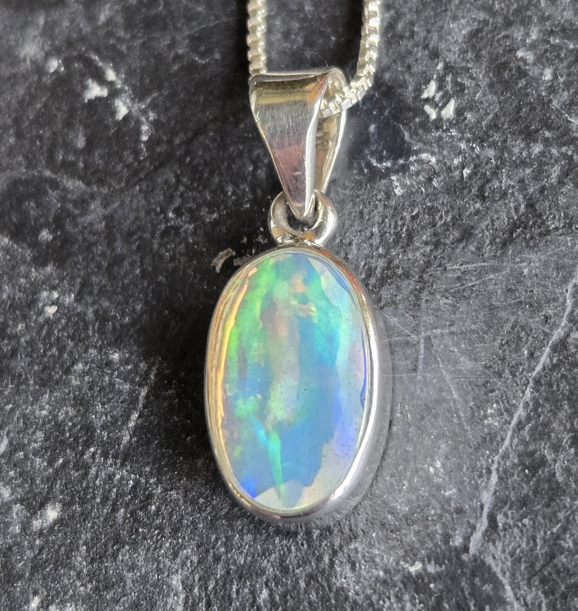 VIT 005 SS Ethiopian Opal Faceted 8x13mm Oval Bezel Set Pendant With Box Chain Necklace, 18"