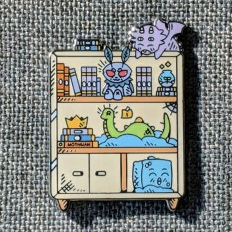 CRYPTID BOOKSHELF PIN