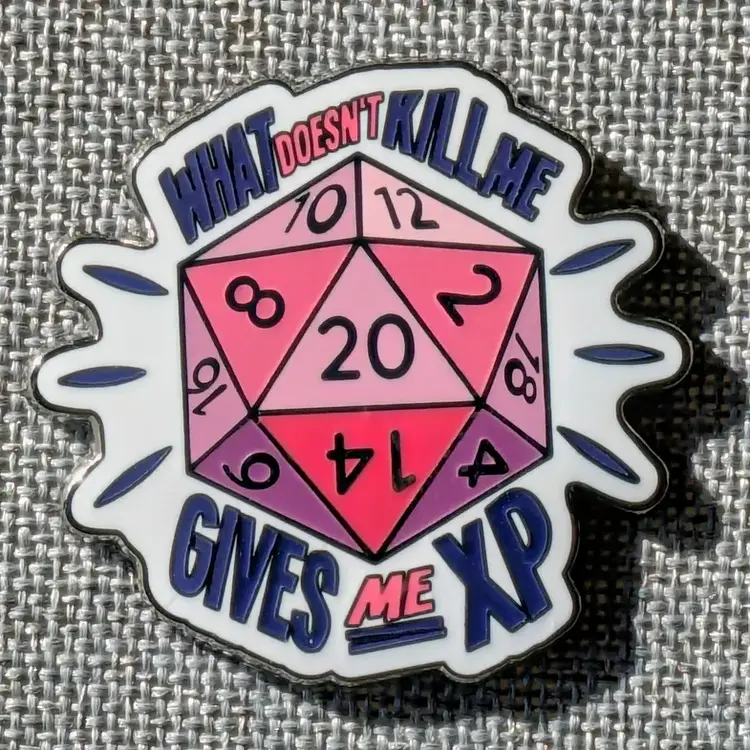 WHAT DOESNT KILL ME XP ENAMEL PIN