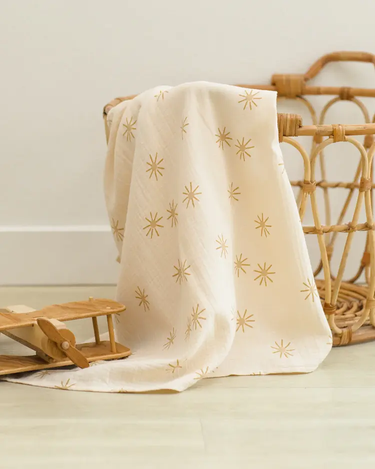 Quincy Mae Woven Swaddle Sunburst