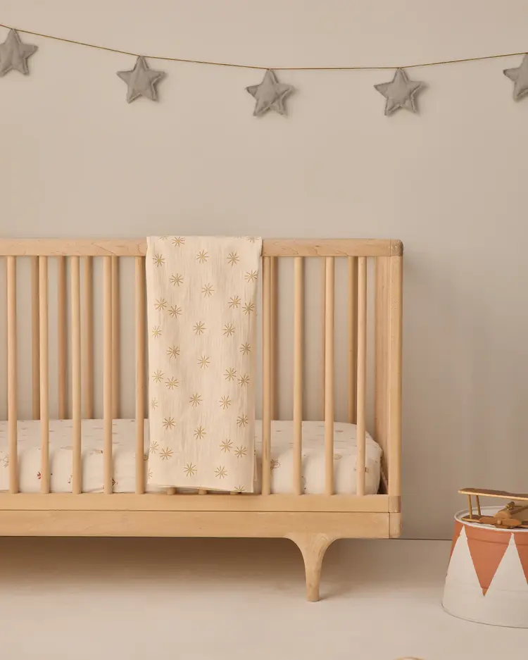 Quincy Mae Woven Swaddle Sunburst