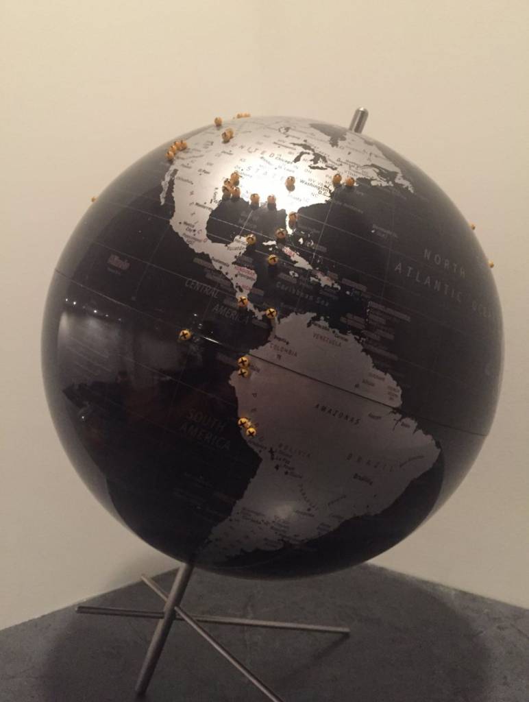 maptacks in a globe