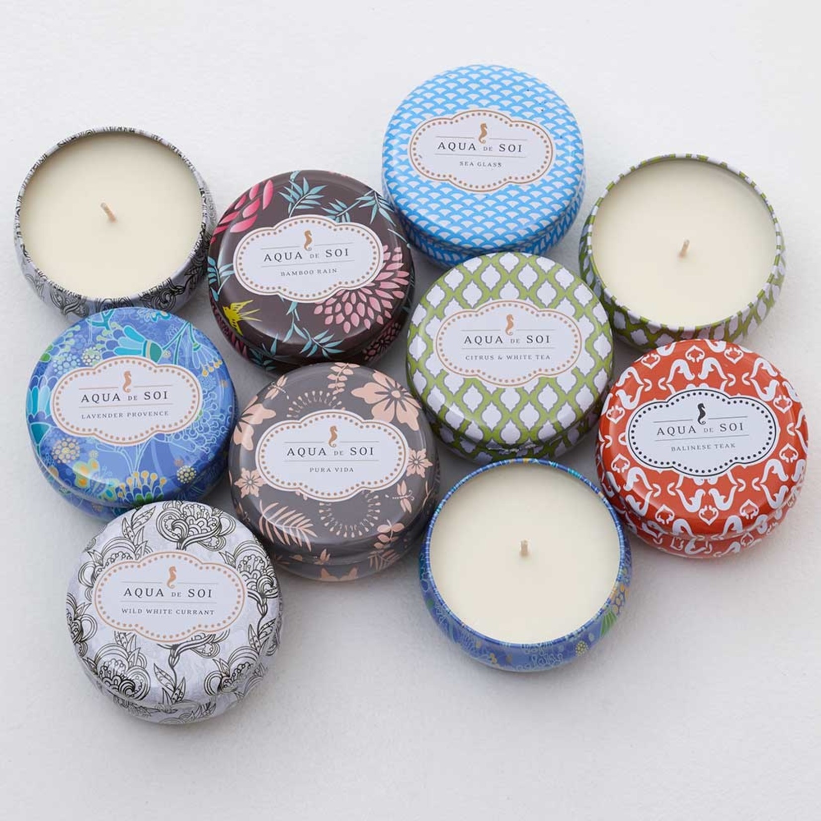 aqua de soi 9 ounce tins candles dedicated to wellness and luxury exit9 gift emporium