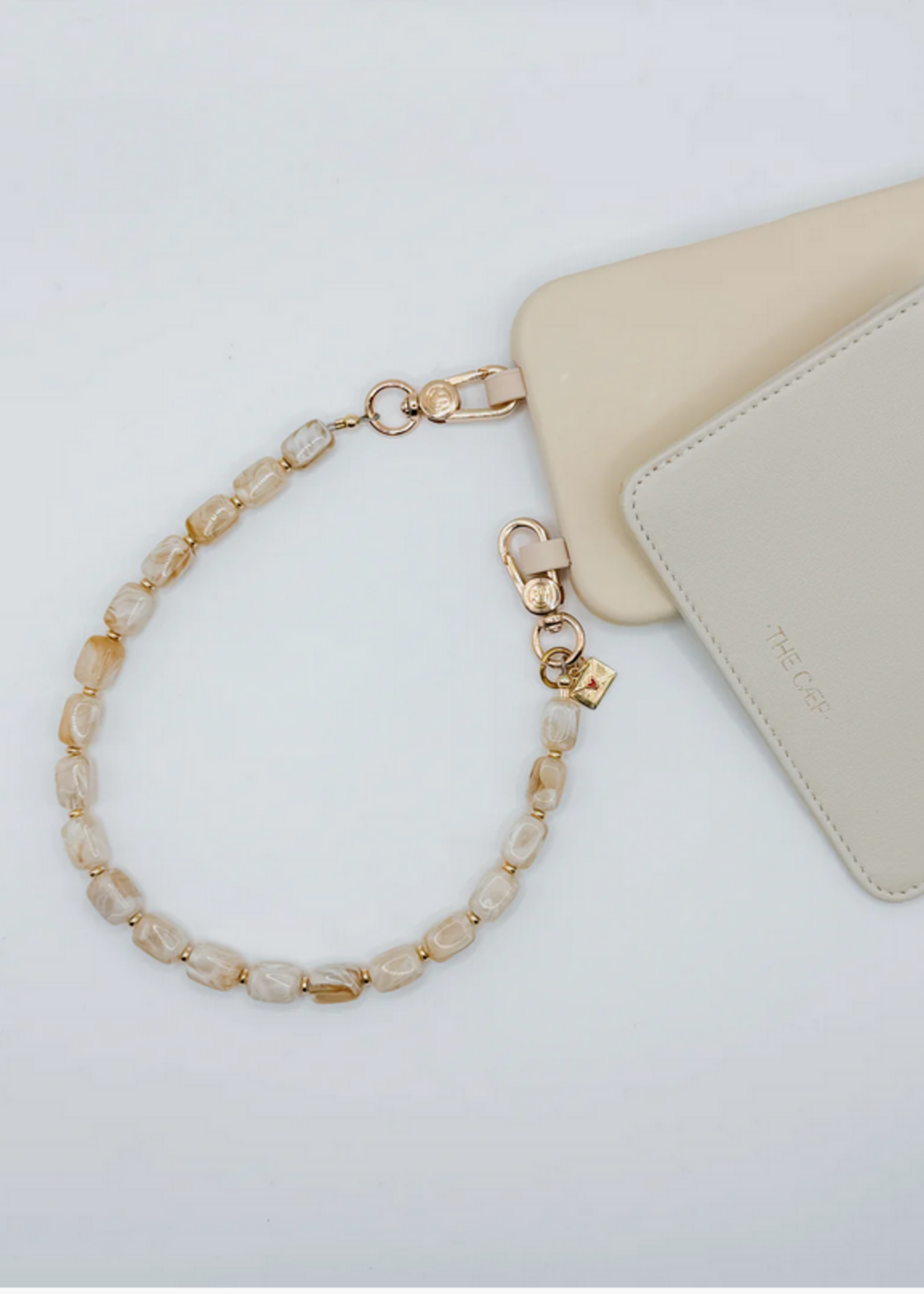 THE CAEP BRUNE PHONE WRISTLET