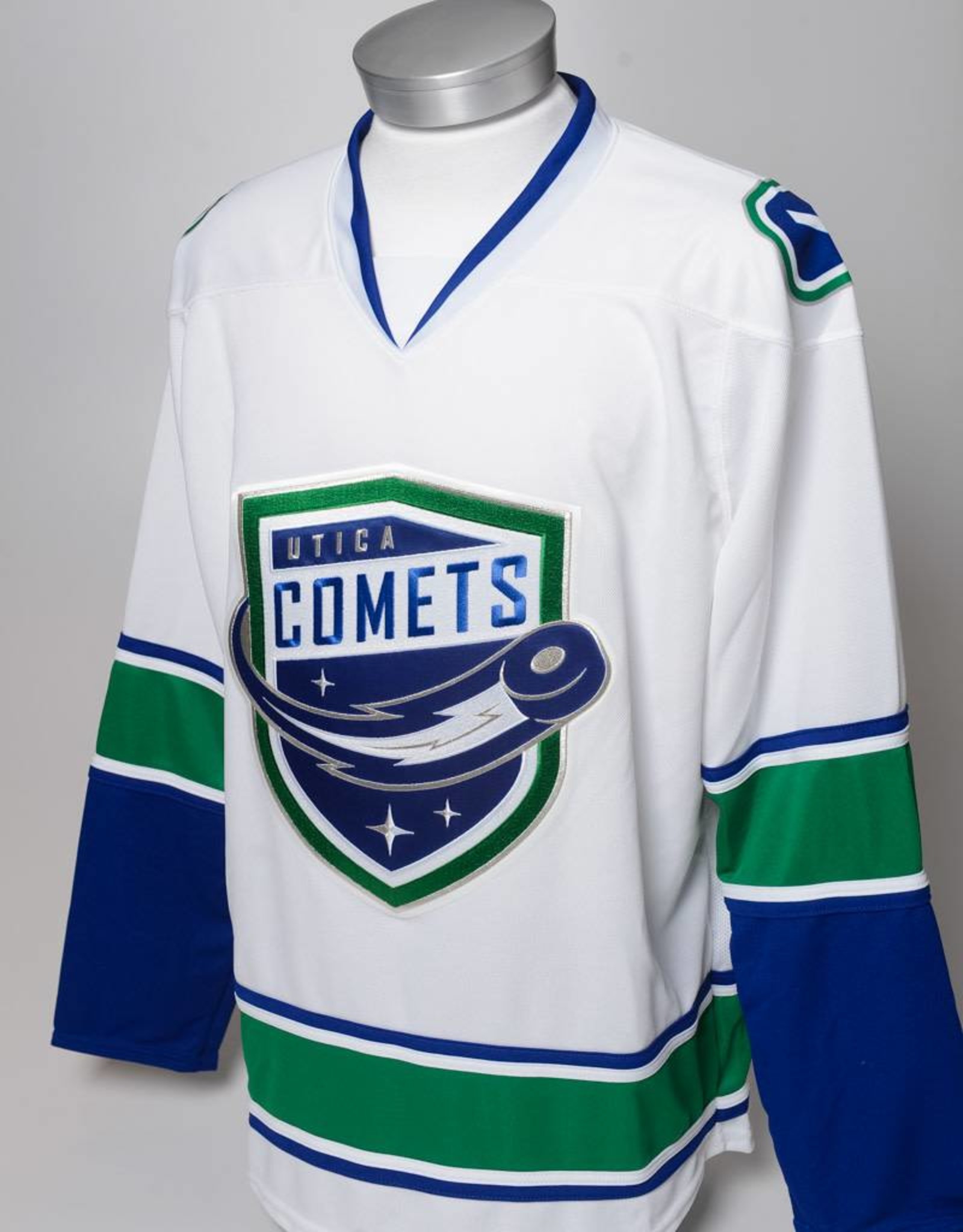 utica comets green jersey