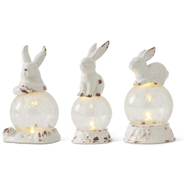 White Ceramic Bunny on Globe