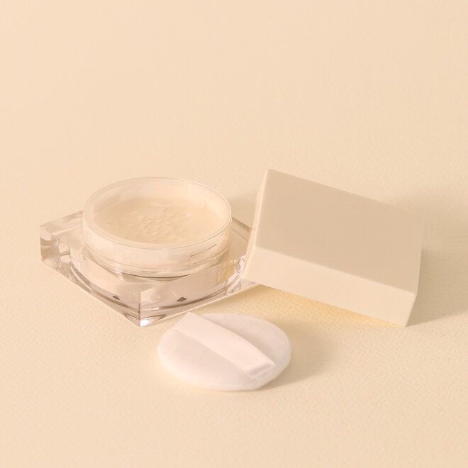 Poudre de fixation lissante
