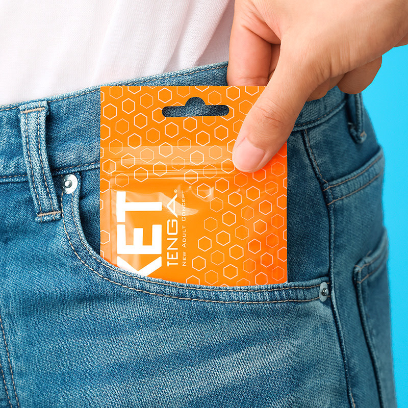 Pocket Tenga in a model's pocket, demonstrating size
