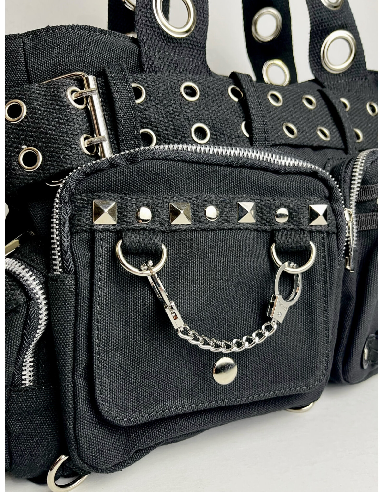 BLACK HANDCUFF HANDBAG