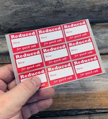 DTA2797 = Adhesive Labels "REDUCED" 1-5/8" x 1-1/8" (Pkg of 500)