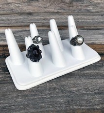 DRG6437 = White Leatherette Seven Finger Ring Display 6-3/4" x 3-7/8"